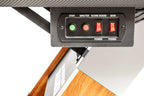 Close-up of the power switch and electronic scorer control panel on the Dybior Blizzard air hockey table.