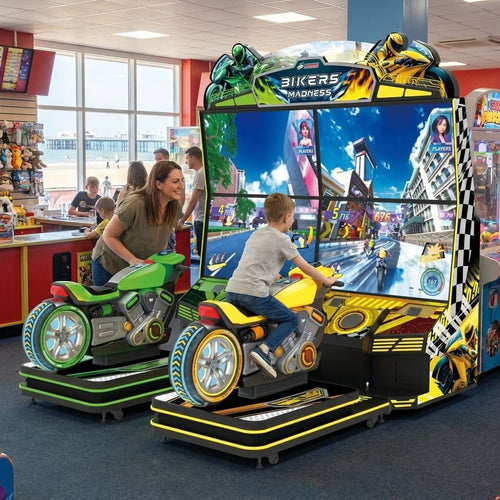Bikers Madness motorbike arcade machine in a UK seaside arcade with a child playing while a parent watches