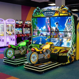 Bikers Madness motorbike arcade machine glowing in a family entertainment centre