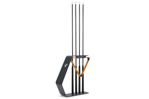 Cornilleau cue stand accessory shown beside the outdoor pool table in Charcoal Grey frame, alternate angle