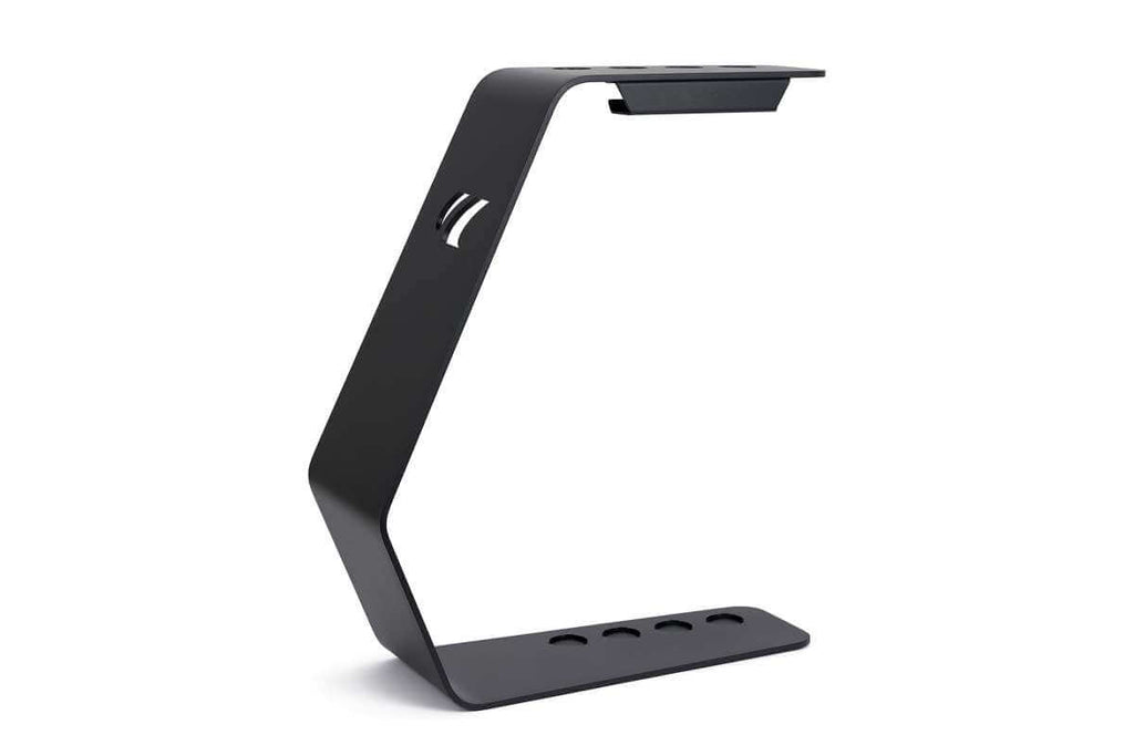 Cornilleau cue stand accessory shown beside the outdoor pool table in Charcoal Grey frame