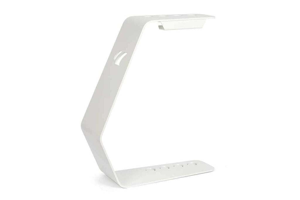 Cornilleau cue stand accessory shown beside the outdoor pool table in White frame