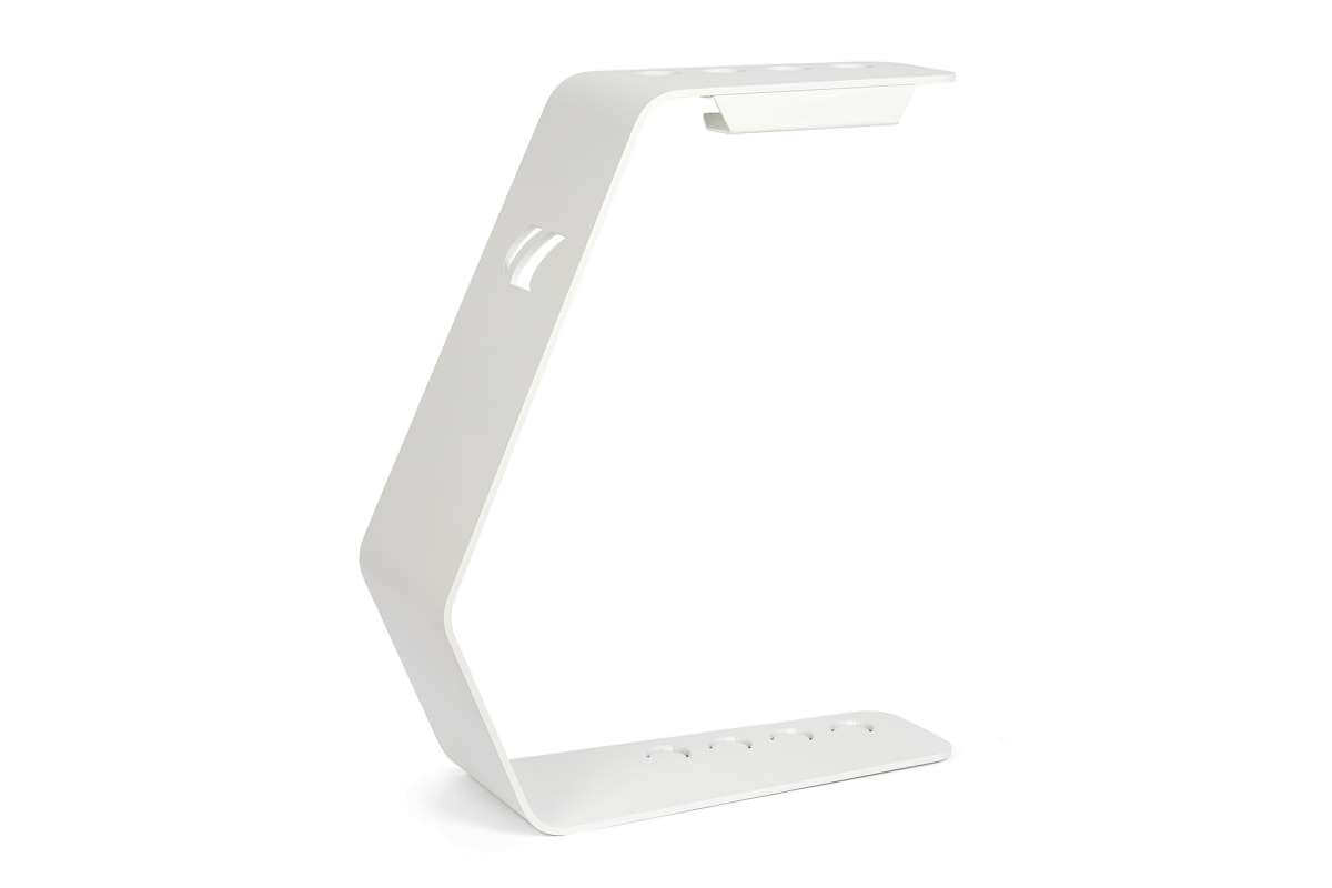 Cornilleau cue stand accessory shown beside the outdoor pool table in White frame