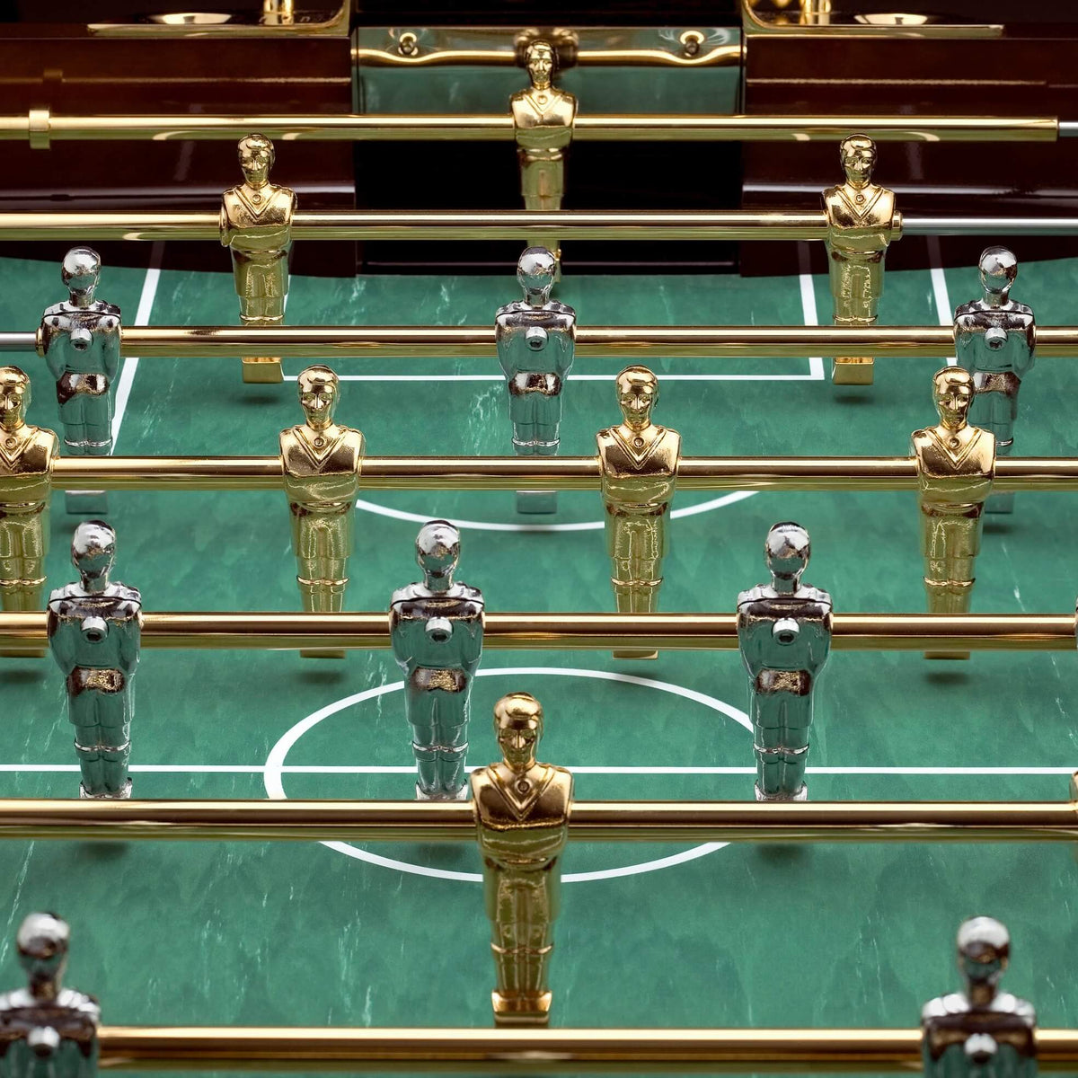 Overhead view of the B50 pitch with gold and chrome teams lined up