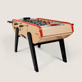 Bonzini B60 coin operated football table in natural beech with red rails and black legs