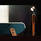 Teal Eames inspired B90 football table end with beech leg in a dark room
