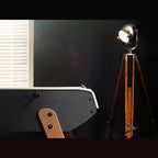 Charcoal Eames inspired B90 football table end with beech leg in a dark room