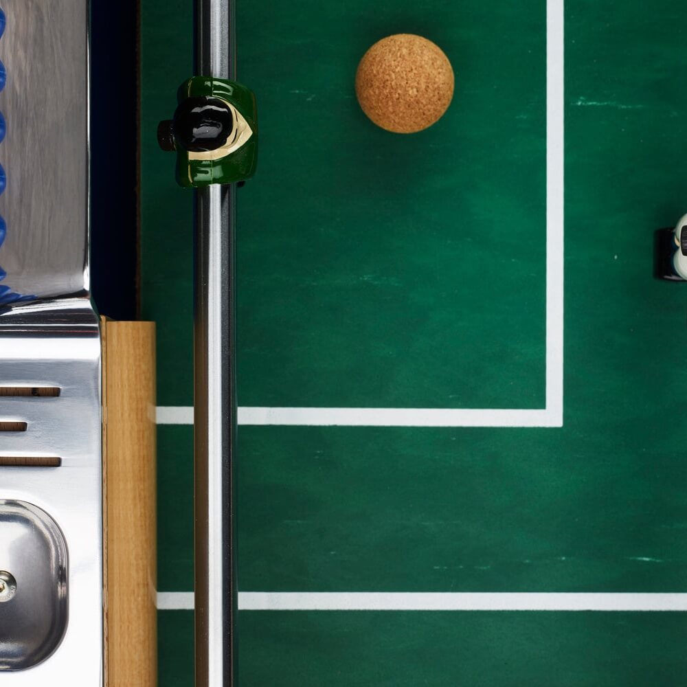 Cork ball near the goal on the green B90 pitch, seen from above