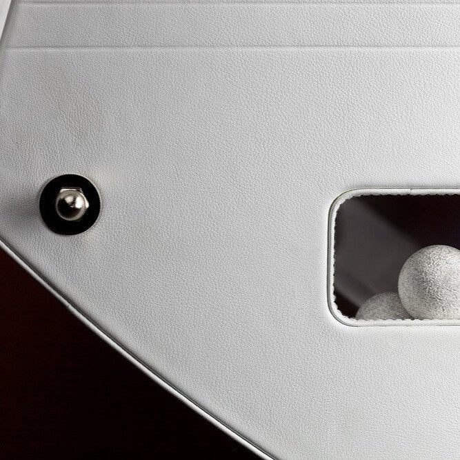 Ball return opening in the white leather side of the B90 football table