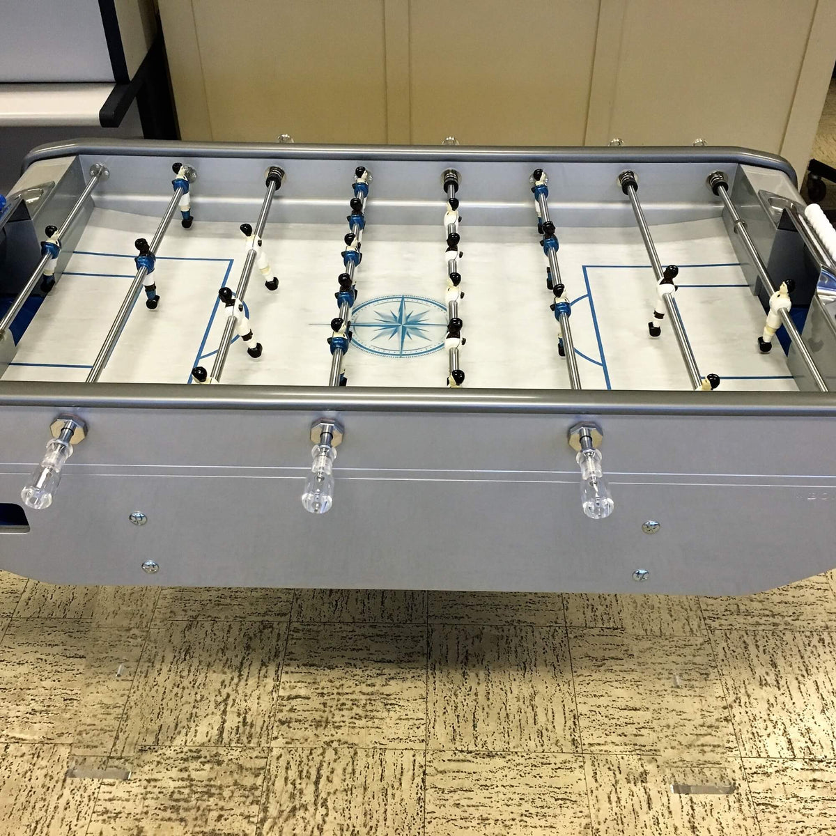 Silver grey B90 football table with Perspex legs, pitch viewed from above
