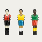 Three Bonzini players painted in red, yellow and green custom team strips