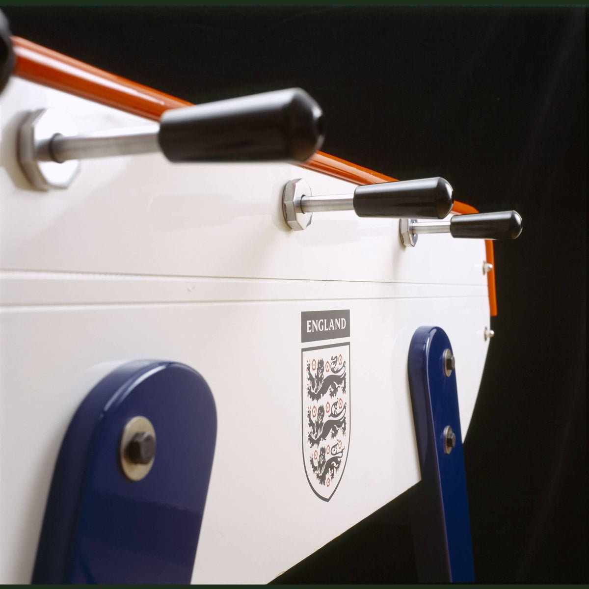 Side of the England B90 football table showing handles and the England crest