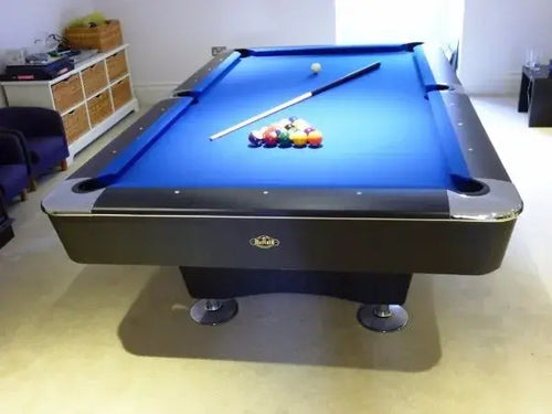 Buffalo Dominator pool table with blue cloth in a games room