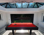 Buffalo Eliminator II in black with red cloth in a garden room