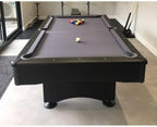 Buffalo Eliminator II Stealth pool table with balls racked in a modern room