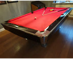 Buffalo Pro II pool table with red cloth, corner view showing the wide sport rail