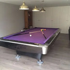 Buffalo Pro II pool table with purple cloth in a games room under pendant lights