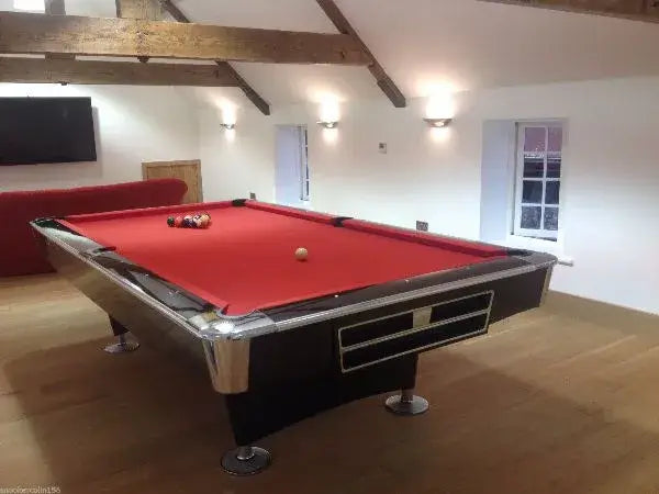 Buffalo Pro II pool table with red cloth in a barn-style games room