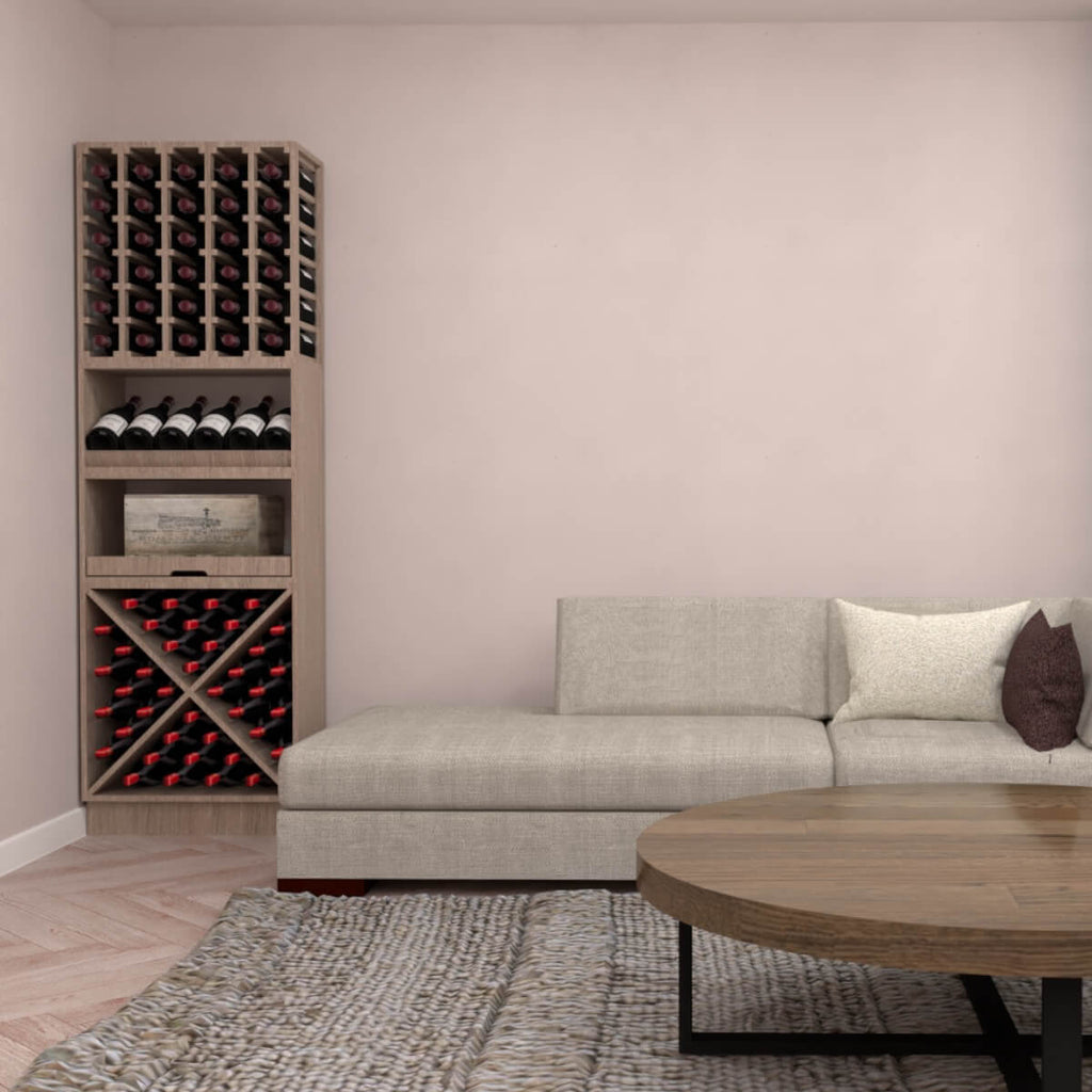 Caverack oak wine rack filled with bottles against a living room wall beside a grey sofa