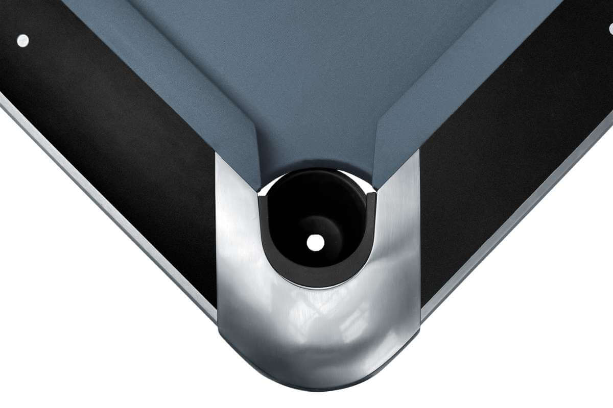 Close-up of an inset corner pocket and sighting-spot frame rail on the black matt Dynamic Competition II