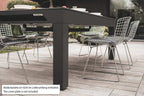 Cornilleau Classic Outdoor Pool Dining Table in Charcoal Grey frame outdoors, side view