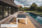 Cornilleau Classic Outdoor Pool Dining Table in White frame set up outdoors on a patio