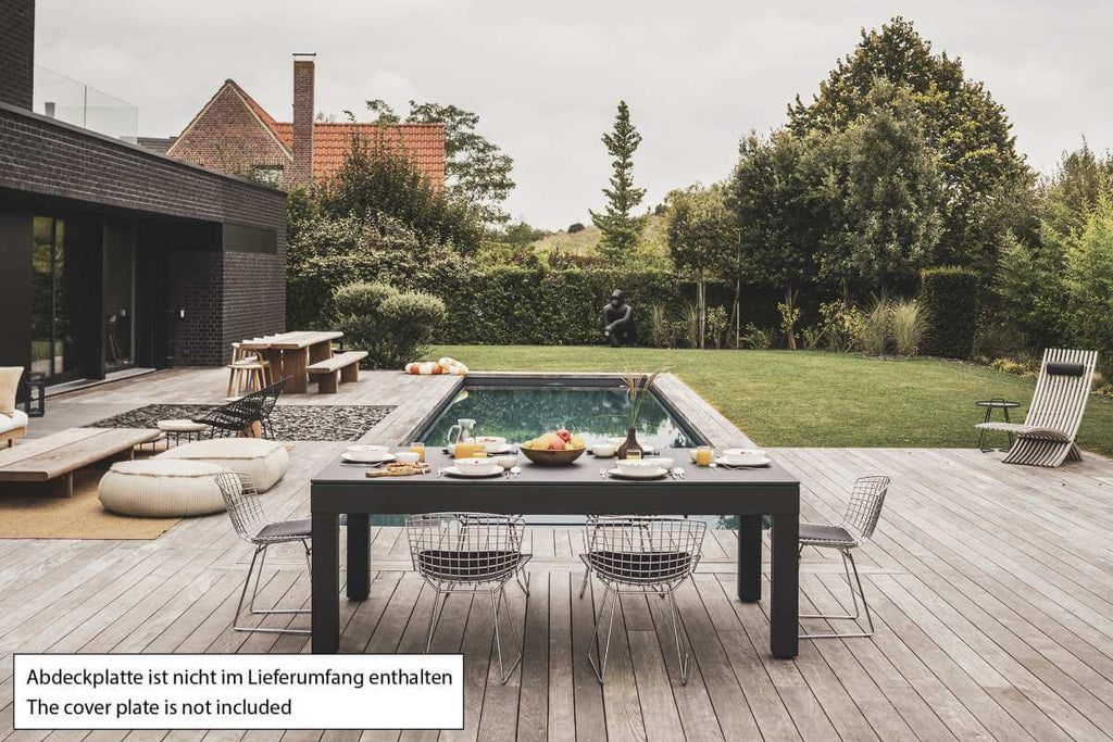 Cornilleau Classic Outdoor Pool Table in Charcoal Grey frame set up outdoors, playing surface uncovered