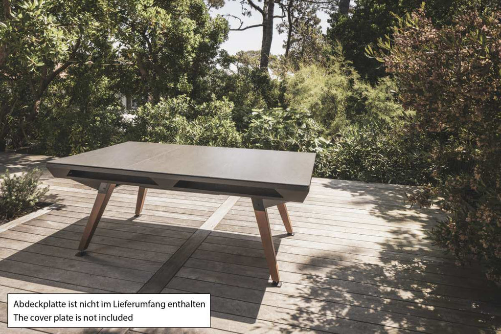 Black Cornilleau Origin outdoor pool table with the dining top cover plate fitted, alternate angle