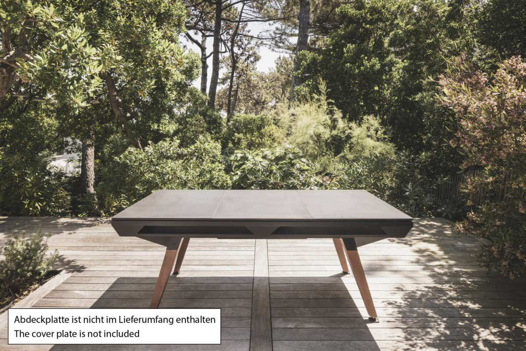 Black Cornilleau Origin outdoor pool table with the optional dining top cover plate fitted