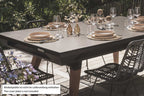Black Cornilleau Origin outdoor dining pool table with the dining top fitted, outdoor setting