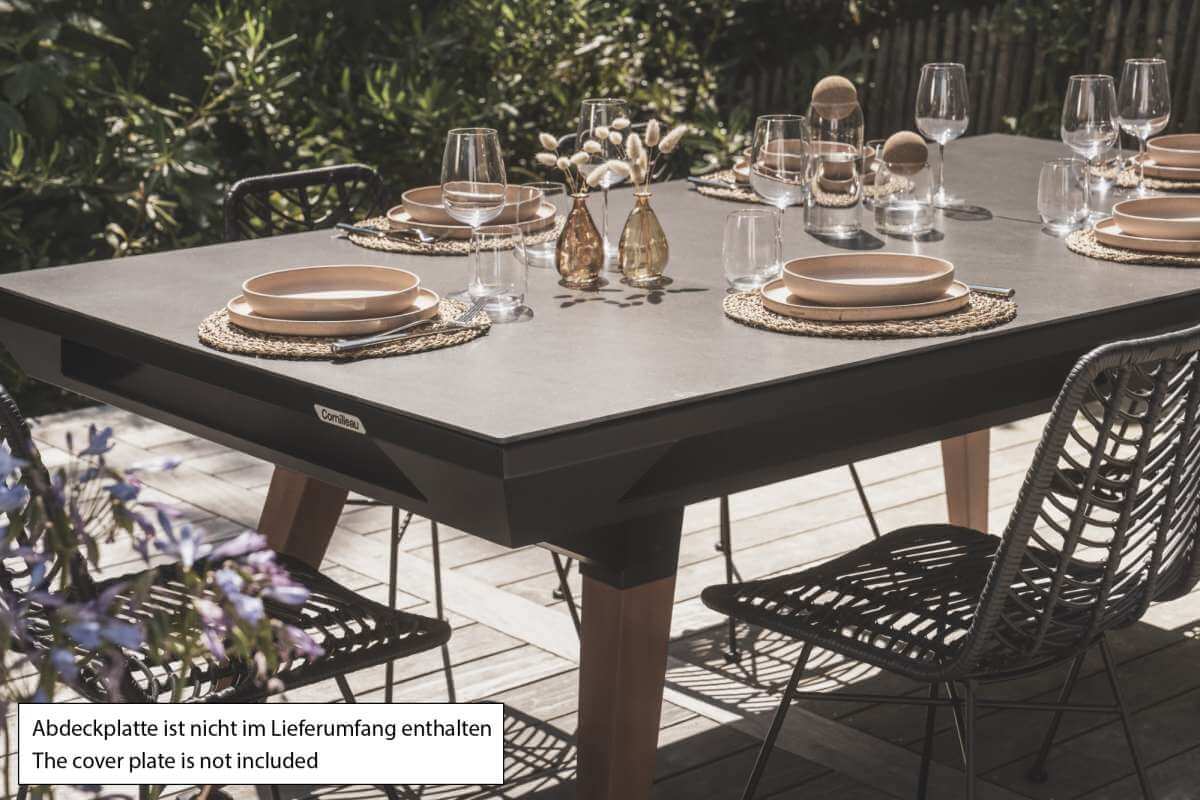 Black Cornilleau Origin outdoor dining pool table with the dining top fitted, outdoor setting