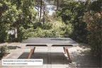 White Cornilleau Origin outdoor pool table positioned outdoors, alternate angle