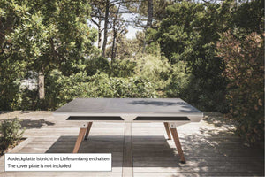 White Cornilleau Origin outdoor pool table positioned outdoors, alternate angle