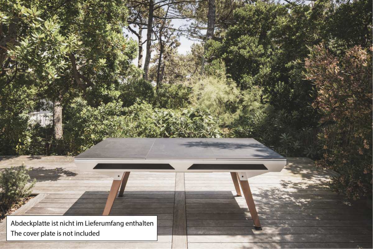 White Cornilleau Origin outdoor pool table positioned outdoors, alternate angle
