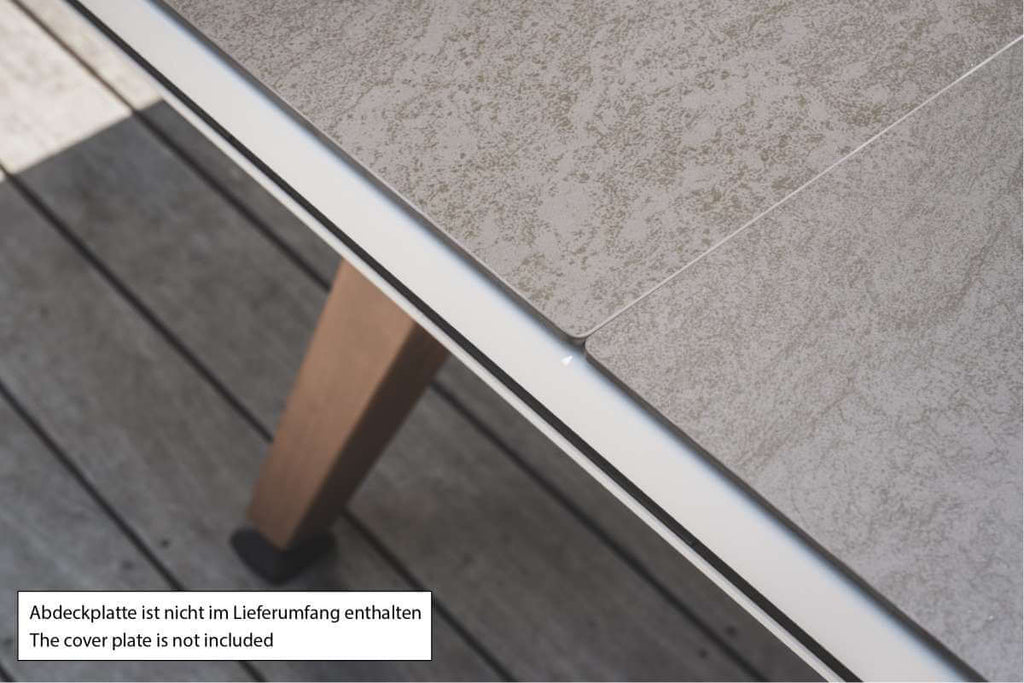 Close-up of the White Cornilleau Origin's weatherproof playing surface material