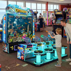 Crossbow Fishing 4 player arcade machine in a UK seaside arcade with a child playing