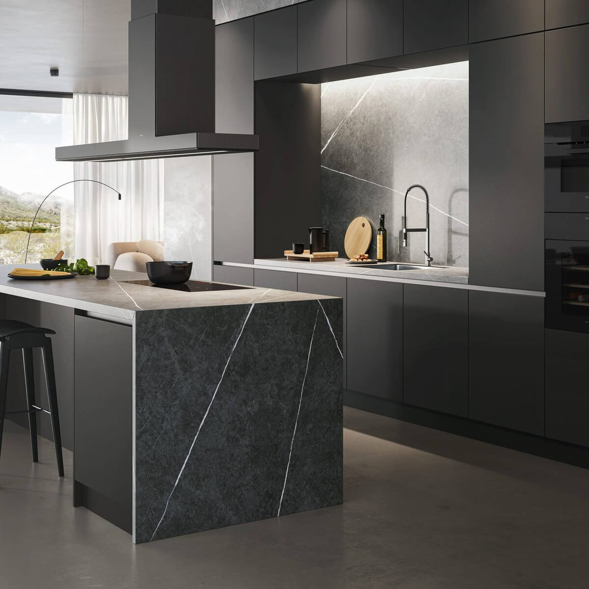 Modern dark kitchen with the Veritas BI24 wine cooler fitted into tall units