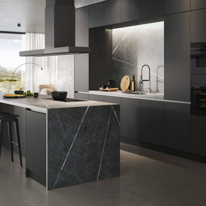 Modern dark kitchen with the Veritas BI24 wine cooler fitted into tall units