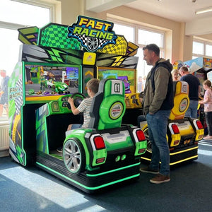 Fast Racing twin racing arcade machine in a UK seaside arcade with a child playing while a parent watches