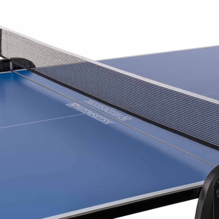 Net across the blue top of the Heemskerk 1900 outdoor table tennis table