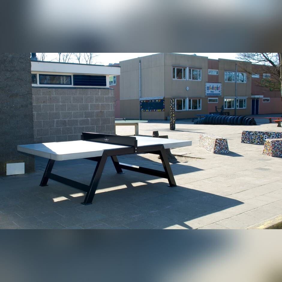 Heemskerk Beta concrete outdoor table tennis table installed on a school playground