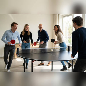 Colleagues playing round the table on a Heemskerk Circle round table tennis table