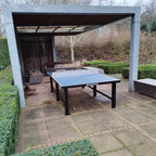 Heemskerk Delta outdoor table tennis table in a sheltered courtyard