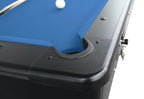 Close-up of the black cushion rail and corner pocket on the Kick Shot with blue cloth