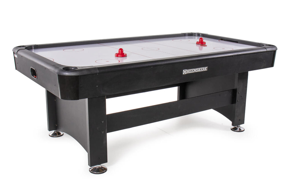 Heemskerk Masterplay 6.5ft air hockey table in black with red pushers on the playfield