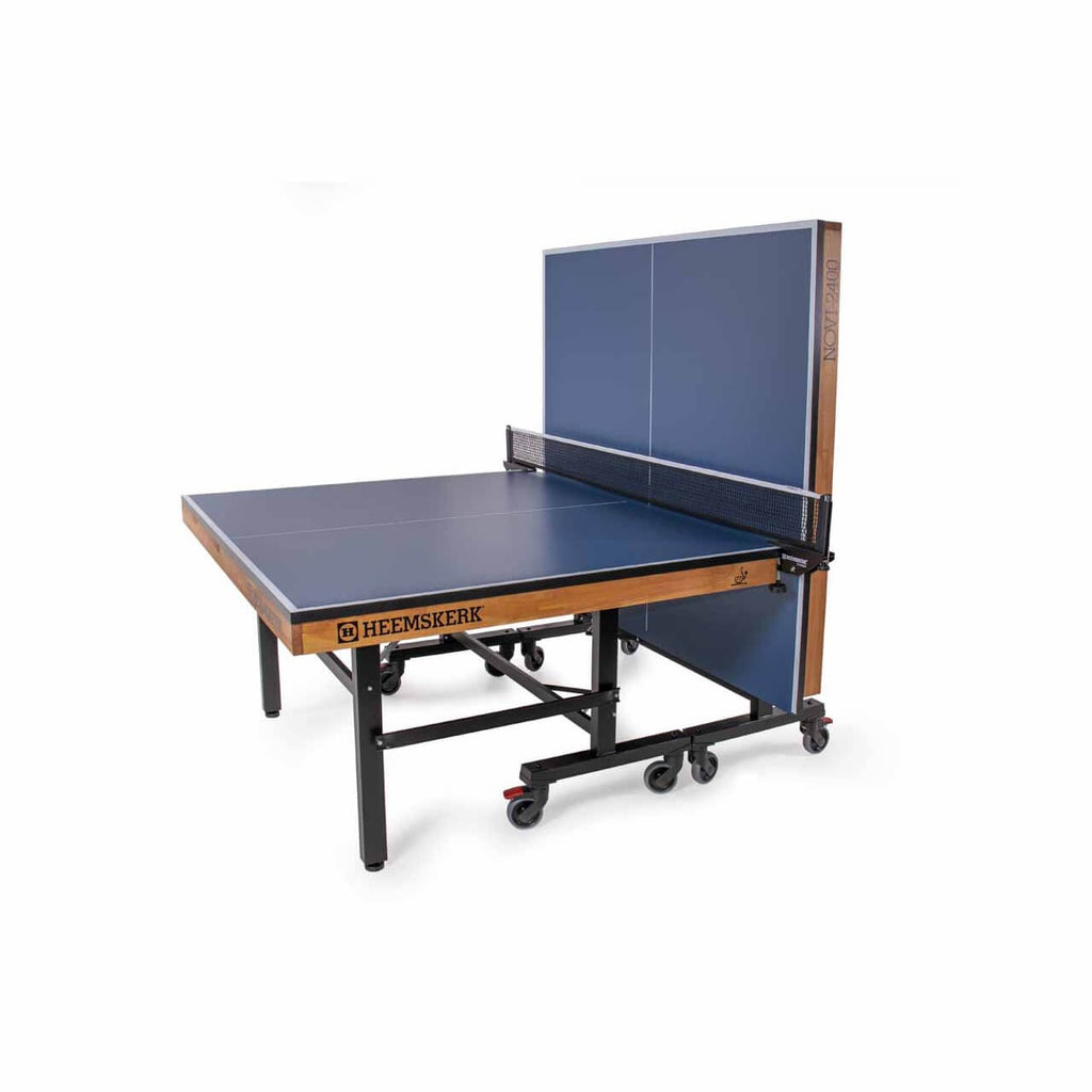 Blue Heemskerk Novi 2400 table tennis table with one half raised for solo practice