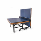 Blue Heemskerk Novi 2400 table tennis table with one half raised for solo practice