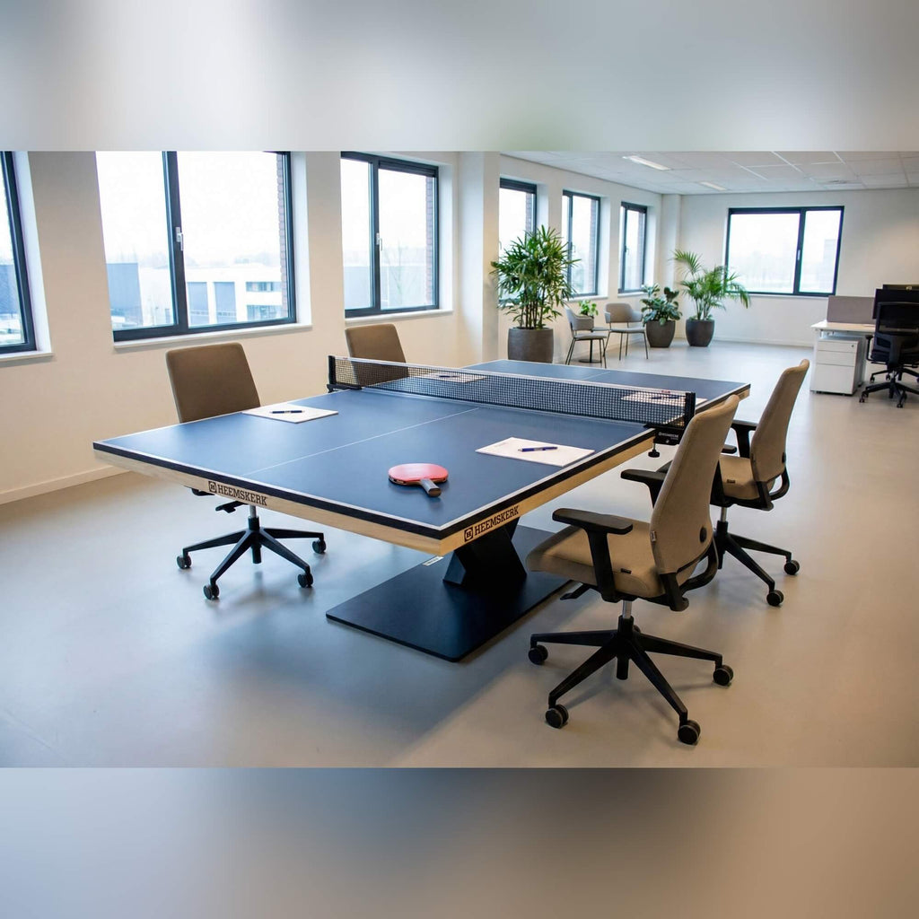 Heemskerk Office 3000 table tennis meeting table with office chairs in a workspace