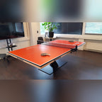 Heemskerk Office table tennis meeting table with an orange top in an office