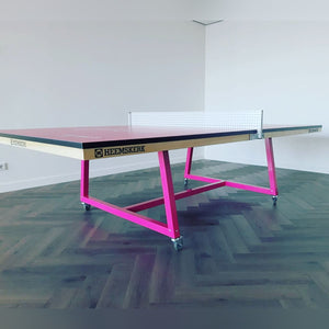 Heemskerk Office 3500 table tennis meeting table with a pink frame on a wooden floor